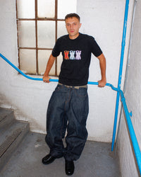 Joe is 6'2" and wears the black Tuned Tiger tee in size L