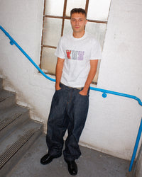 Joe is 6'2" and wears the white Tuned Tiger tee in size L