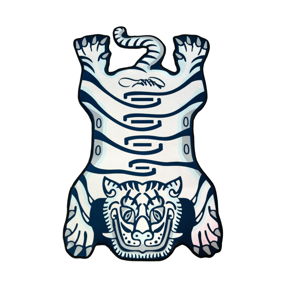 Blue Tuned Tiger rug laid flat on a black background